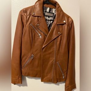 Brown Wilson’s leather jacket